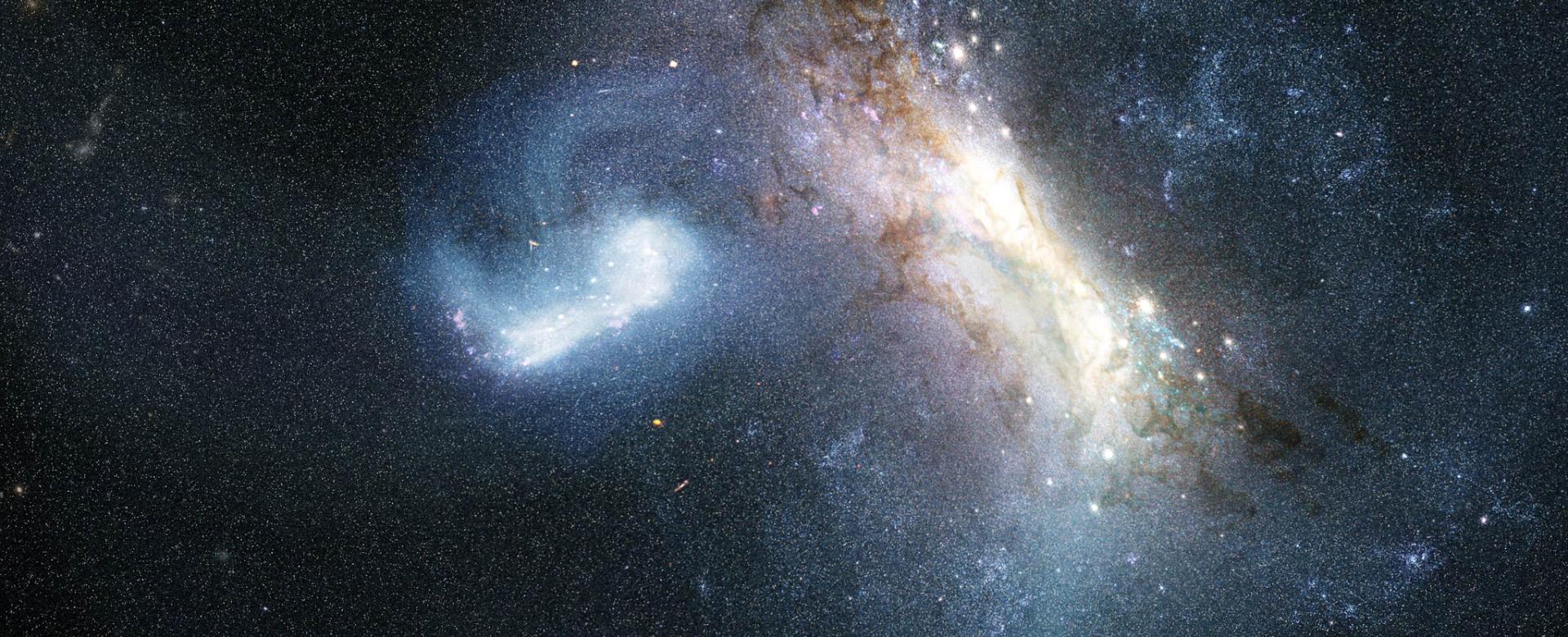 An artist’s impression of the collision between a dwarf galaxy known as LKH (left) and a young Milky Way (right), some 12 billion years ago.