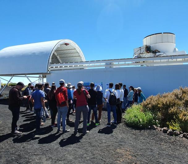 Attendees at the Open Doors Days 2019 at the Teide Observatory in front of the QUIJOTE Experiment. Credit: IAC. Attendees at the Open Doors Days 2019 at the Teide Observatory in front of the QUIJOTE Experiment. Credit: IAC.