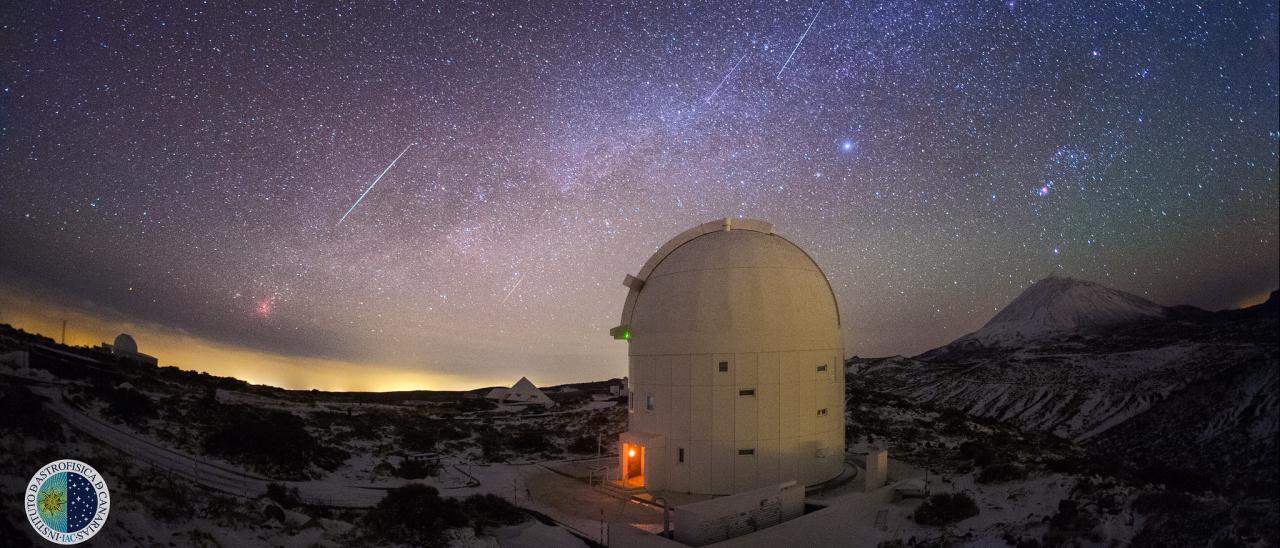 Image of several lines of Geminides observed from the Teide Observatory in the early morning of 14/12/2013. The telescope in the foreground is the OGS (ESA) and above the Teide is the constellation of Orion. Credit: J.C. Casado (StarryEarth). 