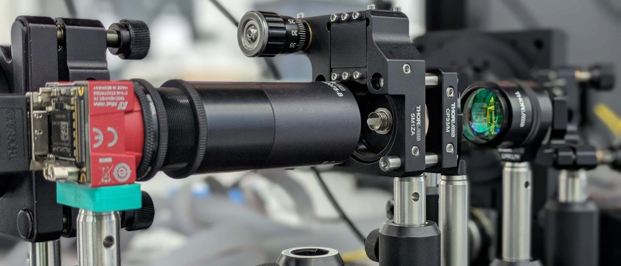 Laboratory optical setup showing the small multimode fibre encapsulated inside a white ferrule and used to experimentally verify the sensor’s behaviour.