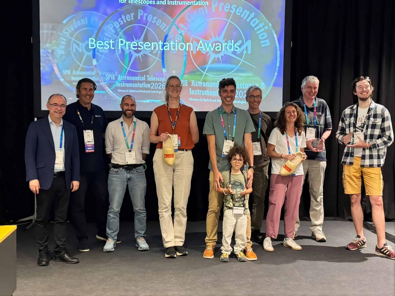 Elvio Hernández Suárez poses with other award recipients at SPIE Astronomical Telescopes + Instrumentation 2026.