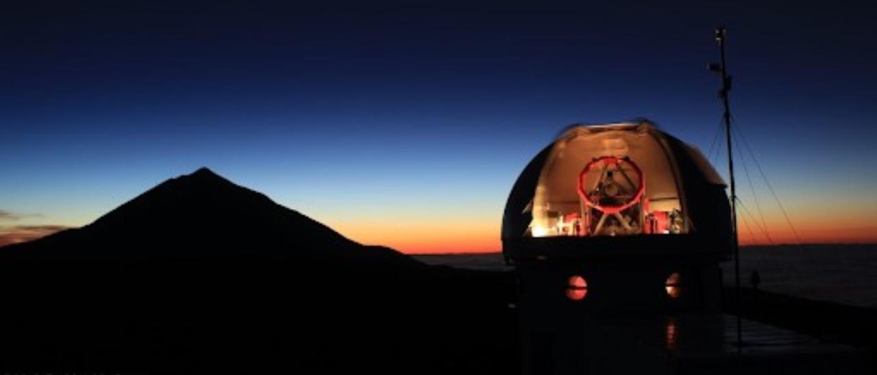 The SONG Telescope at Teide Observatory in morning light during a full moon night. (Photo: Uli Fehr, www.fehrpics.com)  