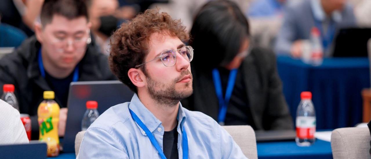 Miguel R. Alarcon, principal investigator at AsteroiDB, at a conference in Hangzhou, China.